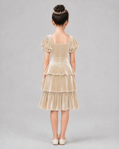 Champagne velvet tiered girls formal dress, back view.