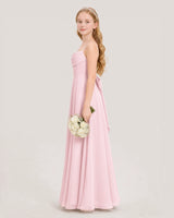 Pink chiffon pleated spaghetti strap junior bridesmaid dress, side view.