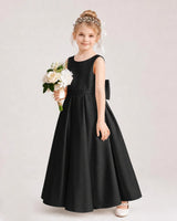 Black satin A-line flower girl dress, side view.