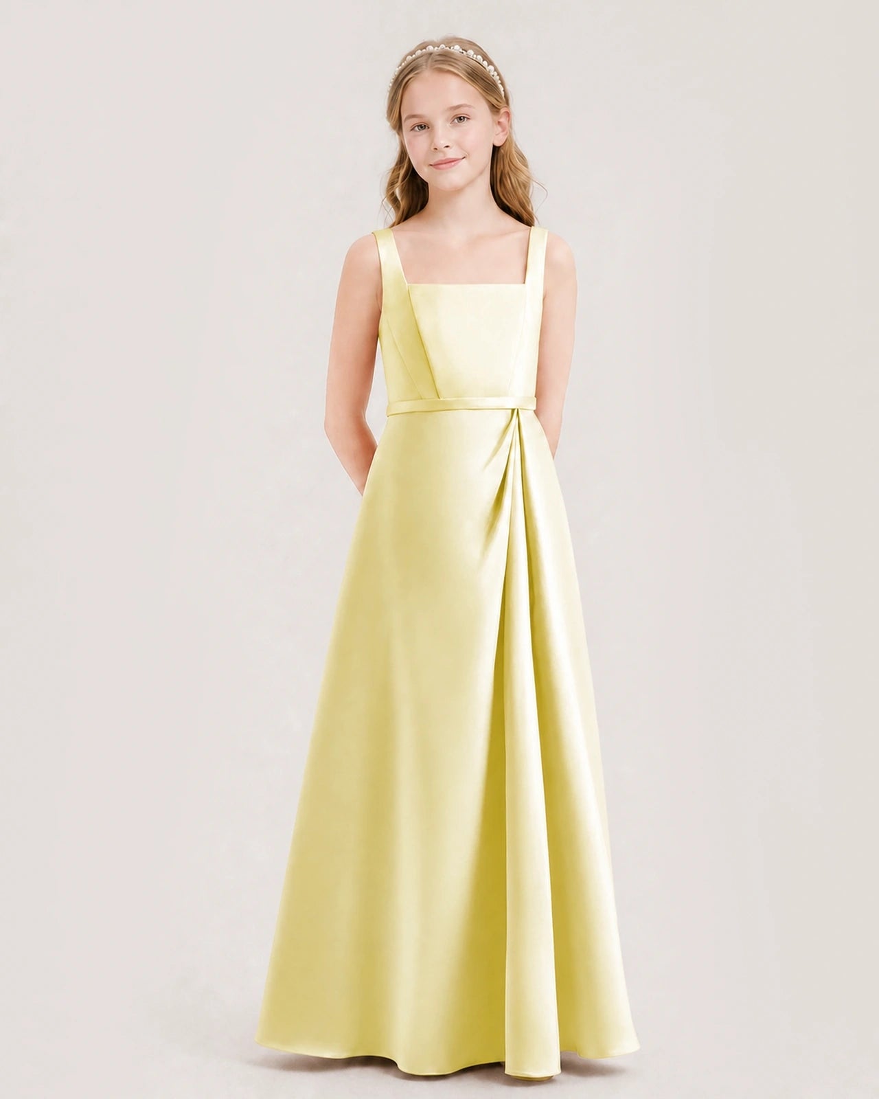Daffodil satin A-line junior bridesmaid dress, side view.