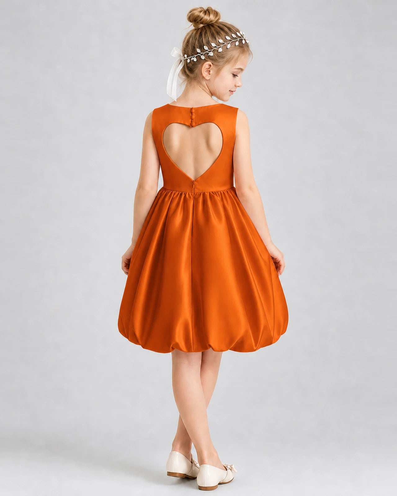 Burnt orange satin heart cutout bubble hem girls formal dress, back view