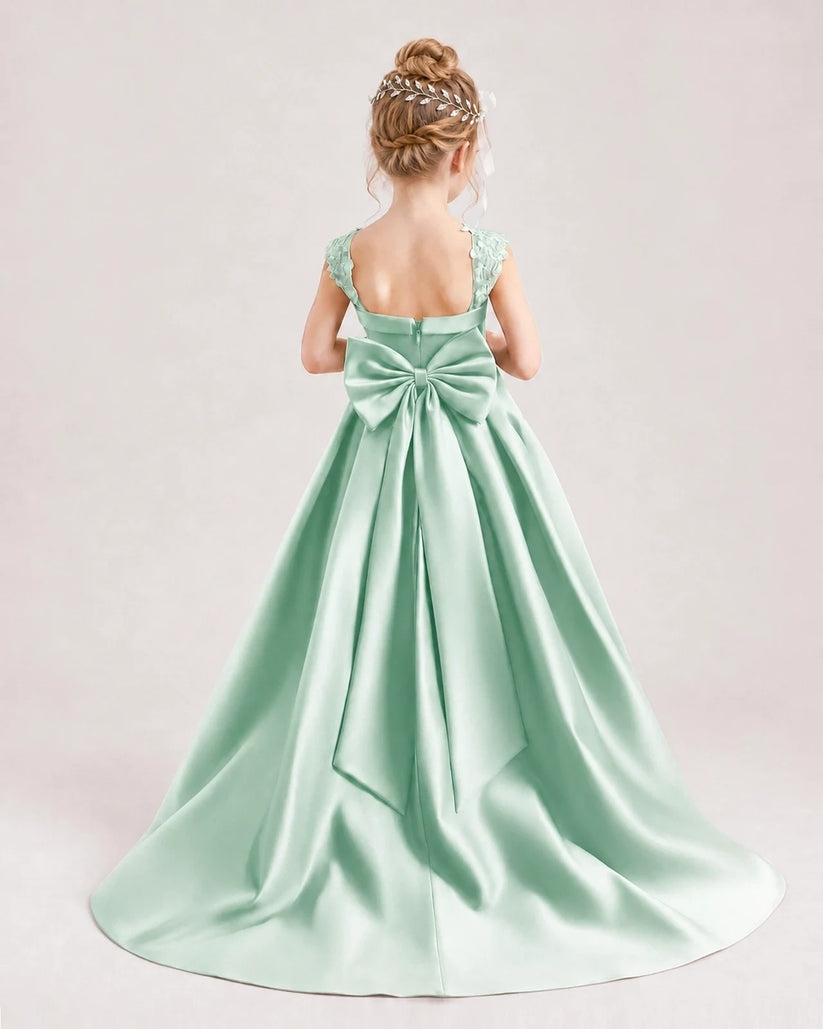 Mint green satin A-line flower girl dress, back view.