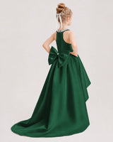 Dark green satin high-low halter neck girls formal dress, back view.