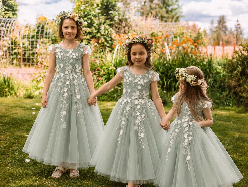 Flower girl dresses in a garden wedding